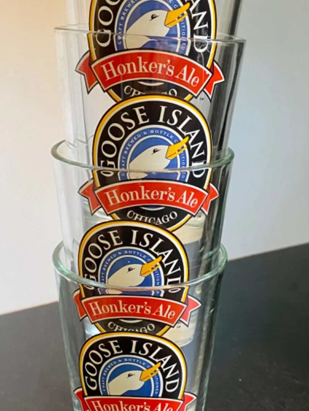 Four Beer Glasses from Goose Island, Chicago. Sturdy, Preowned, Minimal Use.